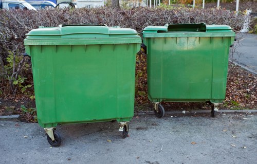 Workers clearing rubbish from a residential area